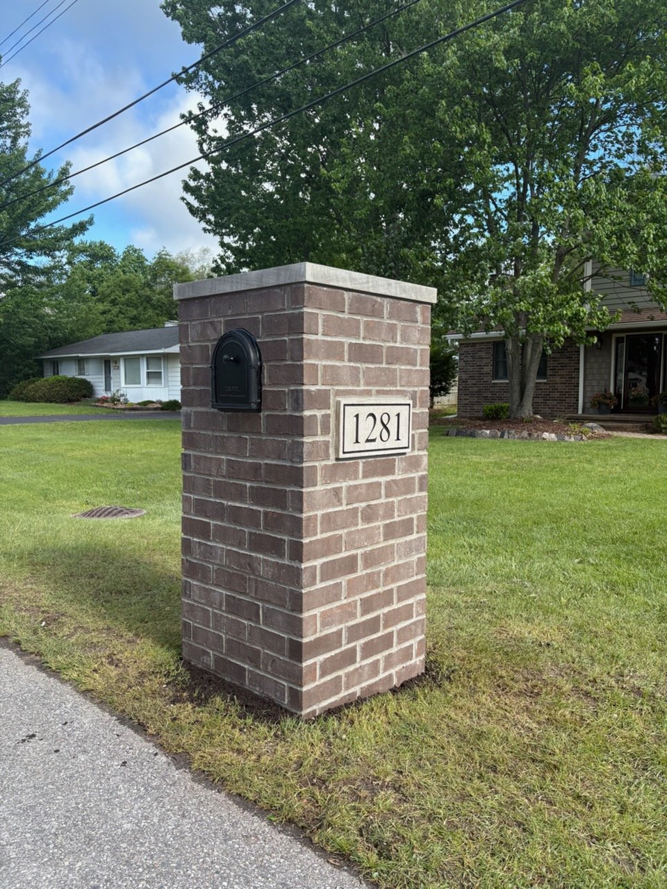 Custom brick masonry mailbox pillar — Grey Oaks craftsmanship